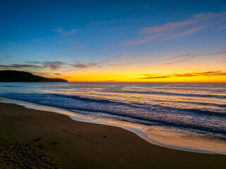 Sunrise at the seaside with high cloud