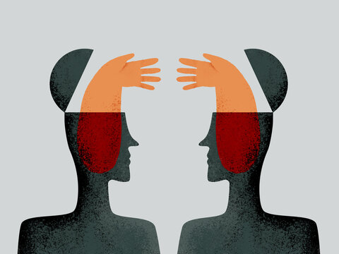 Business persons extending hands