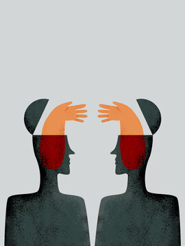 Business persons trying to shake hands