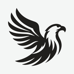 Obraz premium Majestic Eagle Head Silhouette Logo: A Symbol of Strength and Freedom