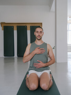 Young Man Doing Heart Meditation 