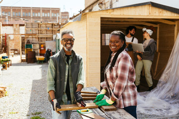 Volunteers working together in community garden