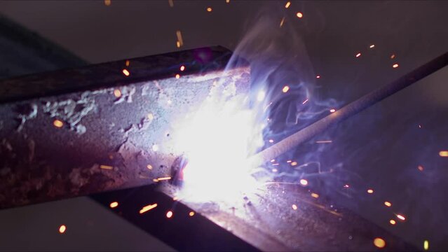 Industrial Metal Welding Sparks and Flashes Flying