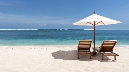 Fototapeta premium Relaxing sun loungers under an umbrella, beach and ocean view, paradise beach setting, calm and inviting atmosphere