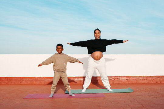 Mother and son doing exercise