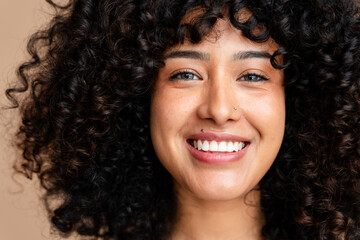Radiant smile - close-up portrait of a joyful woman