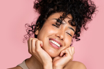 woman with beautiful curly hair smiling
