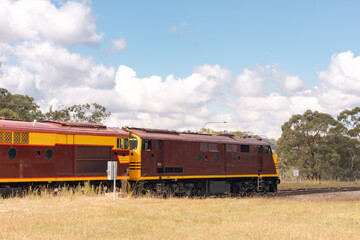 Naklejka premium Dual engines of the Southern Aurora passenger train stopped at remote station