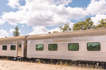 Fototapeta premium The iconic 'Southern Aurora' passenger train stopped at remote Ben Bullen Station