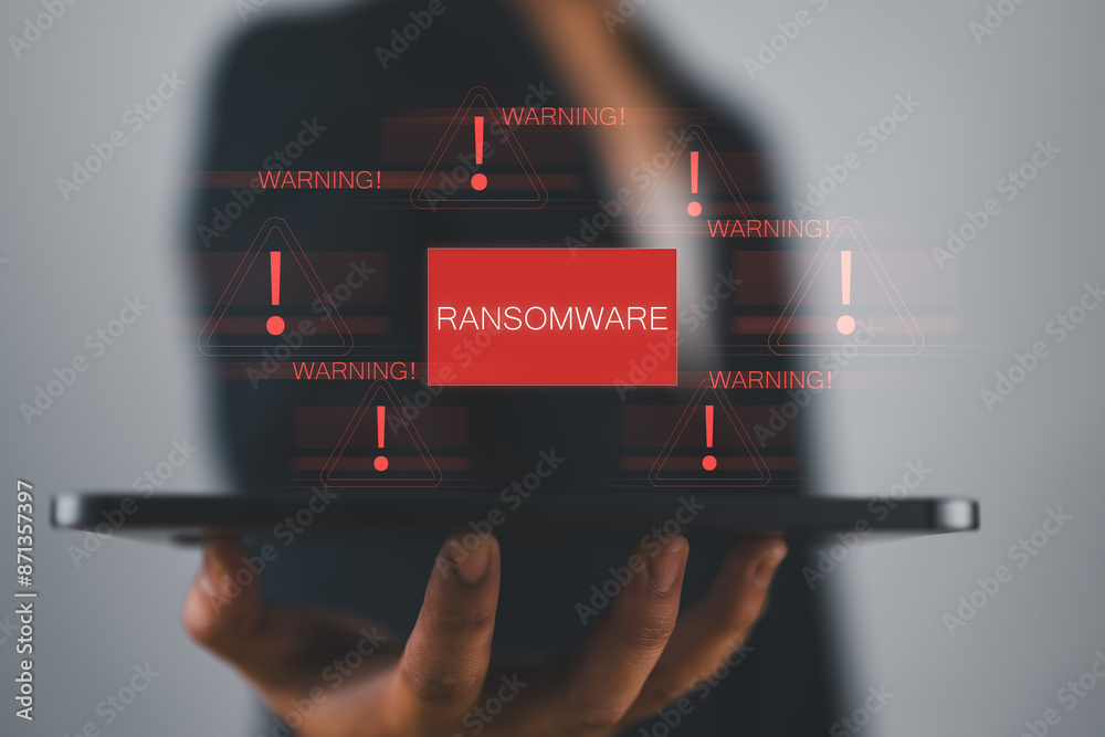 Poster Malware attack virus alert. Person use tablet with virtual warning sign with ransomware word. warning notification, Cyber threats.