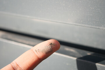 Dust and Dirt on finger closeup 