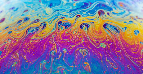 Colorful rainbow soap bubbles close up. abstract colors texture background.