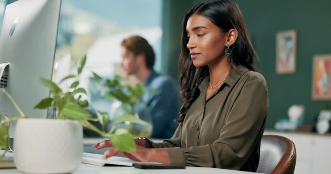 Computer, design and phone with creative woman in office for communication, networking or typing. Bank, payment alert and notification with employee in workplace for contact or web development