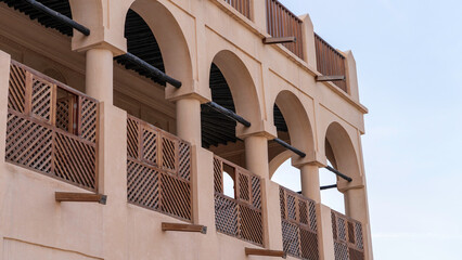 traditional qatari house exterior at the national qatar museum.