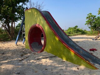 children's slide on the beach