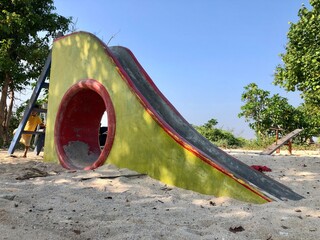 children's slide on the beach