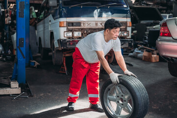 Mechanic Rolling Car Tire