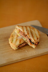 A ham panino sandwich for snack.