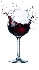 red wine pouring into the glass