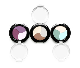 Beautiful eyeshadows palettes on white background