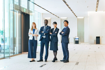 A group of multinational business people standing in a lobby