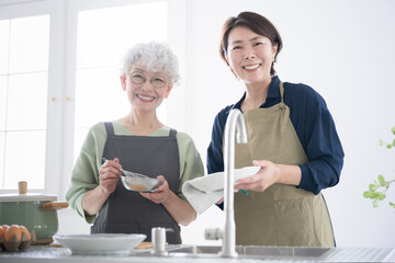  Cooking class scene Teacher and student looking at the camera