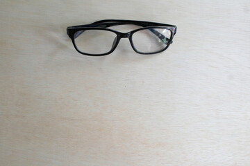 blank background glasses object,text design template,creamy white background,education theme