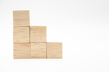 Pyramid of empty wooden blocks with copy space. Blank wooden cubes for wording and infographic icon.