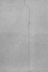 Cement wall texture background has cracks, gray color.