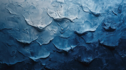 paint textures of aged, blue paint on a weathered concrete wall