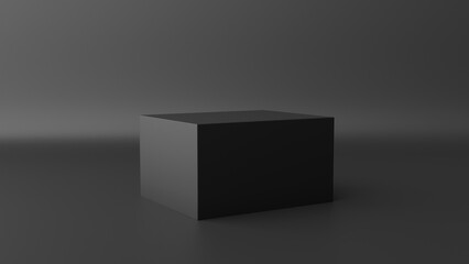 a black cube on a gray surface