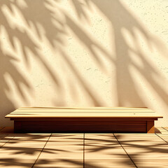 Empty wood table top on beige wall texture with tree leaves shadow background