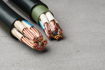 Different Types of Electrical Wires on Gray Concrete Surface