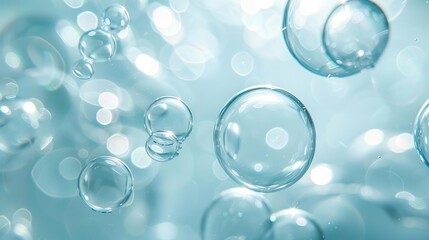 Translucent blue bubbles of varying sizes, floating in midair, against a pale blue background with light reflections