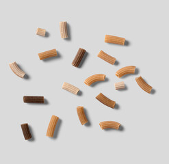 Wolegrain penne pasta from durum wheat ,Pasta isolated on a gray background. Top view , raw