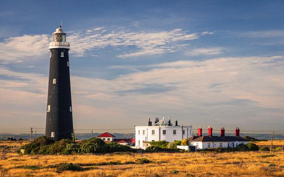 The old lighthouse at Dungeness on the Kent coast south east England UK