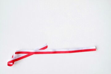 Indonesia’s flag. Red and white ribbon background. Indonesia independence day concept