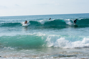 professional surfer riding waves, men catching waves in ocean, isolated. Surfing action water board sport. people water sport lessons and beach swimming activity on summer vacation