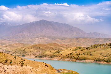 A mountain range with a river running through it