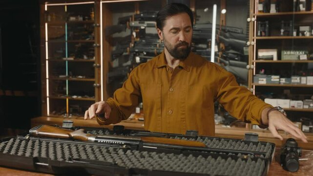 Salesman packing gun machine in case for safety storage