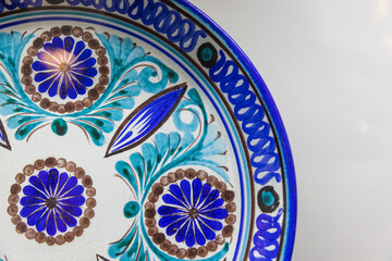 Handmade Uzbek plate with traditional colorful pattern