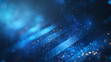Fototapeta premium Abstract blue background with dynamic light streaks and shimmering particles.