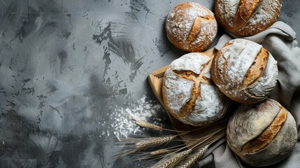 Fresh round sourdough bread with rye and wheat on concrete background modern healthy baking concept