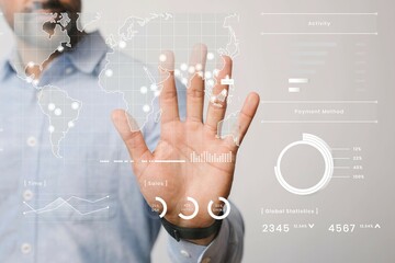 Man pressing his palm to a screen