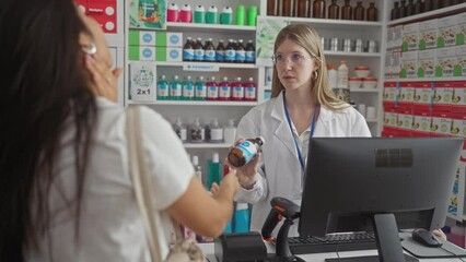 A female pharmacist advises a female customer inside a well-stocked drugstore, highlighting professional healthcare consultation.