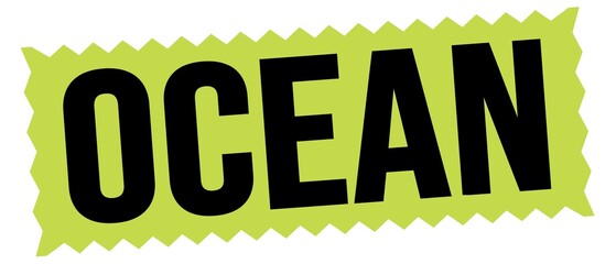 OCEAN text written on green-black stamp sign.