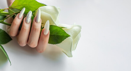Female Hands with beautiful pearl manicure