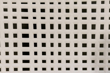 A beautifully crafted weaving pattern showcases its intricate and geometric design, blending traditional craftsmanship with modern aesthetics. The interlaced threads form a symmetrical and detailed