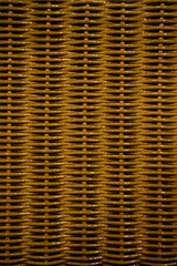 A beautifully crafted weaving pattern showcases its intricate and geometric design, blending traditional craftsmanship with modern aesthetics. The interlaced threads form a symmetrical and detailed