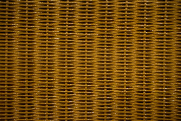 A beautifully crafted weaving pattern showcases its intricate and geometric design, blending traditional craftsmanship with modern aesthetics. The interlaced threads form a symmetrical and detailed